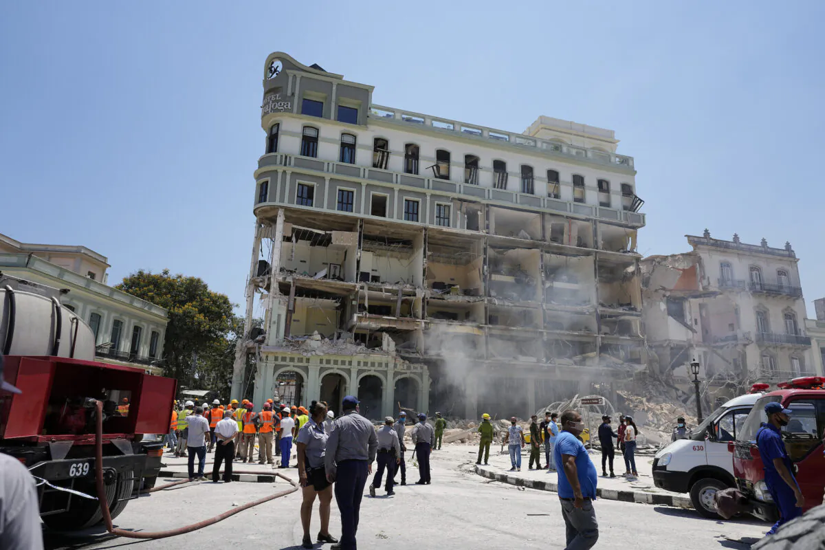 Rooms are exposed at the five-star Hotel Saratoga where emergency crew work after a deadly explosion in Old Havana, Cuba, May 6, 2022. (Ramon Espinosa/AP Photo)