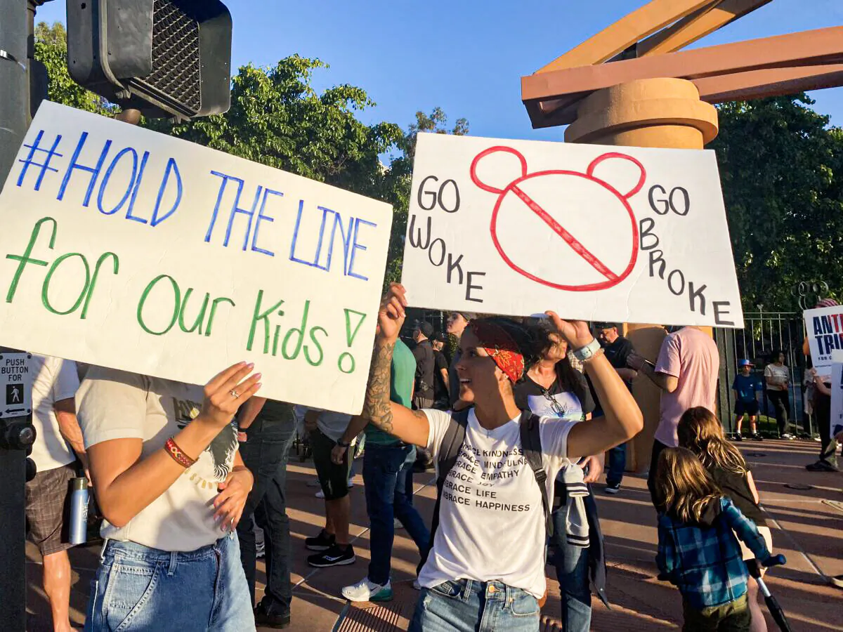 Protesters rally in opposition to The Walt Disney Company's stance against a recently passed Florida law outside of the company's headquarters in Burbank, Calif., on April 6, 2022. (Jill McLaughlin/The Epoch Times)
