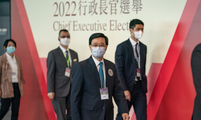 Hong Kong Chief Executive candidate Lee Ka-chiu arrives to greet the Election Committee members at the Exhibition and Convention Centre in Hong Kong on May 8, 2022. (Anthony Kwan/Getty Images)