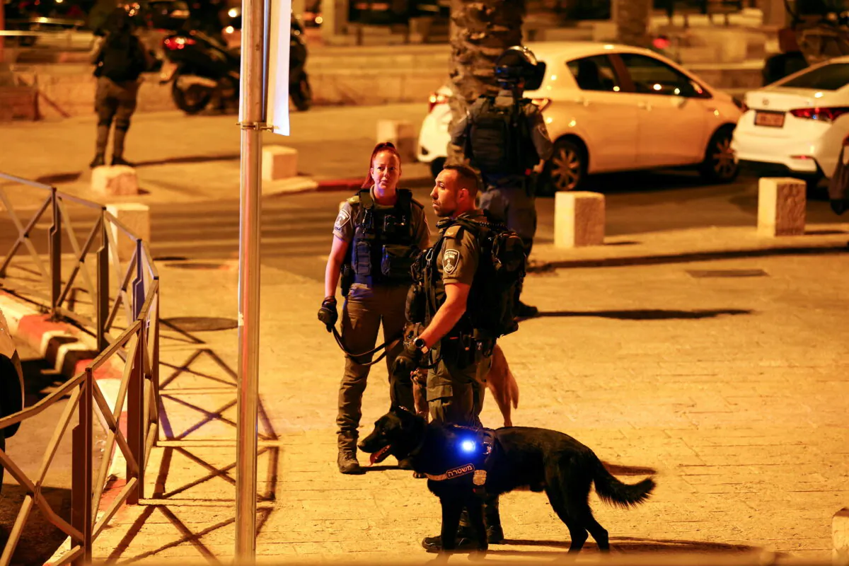 Israeli border police force secure the area around Damascus gate to Jerusalem's Old city, following an incident by the gate, on May 8, 2022. (Ronen Zvulun/Reuters)