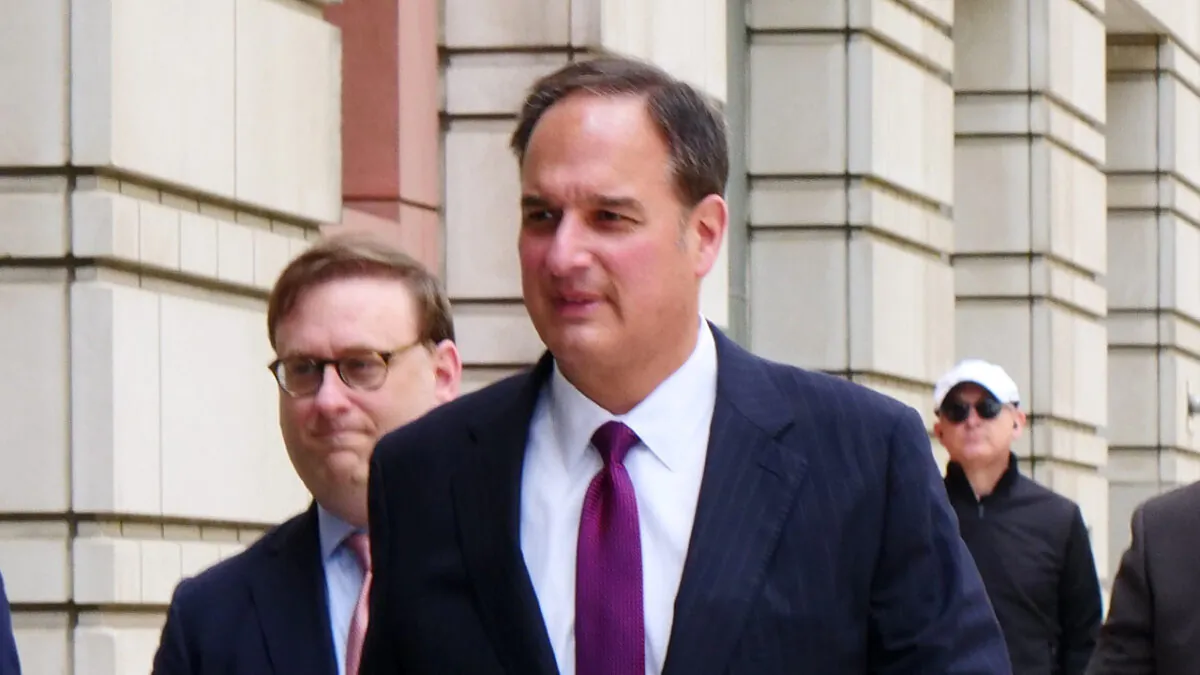 Michael Sussmann arrives for a court hearing at a federal courthouse in Washington on April 27, 2022. (Oliver Trey/The Epoch Times)
