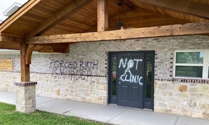 A vandal left pro-abortion slogans on Loreto House, a crisis pregnancy center in Denton, Texas, on May 7, 2022. (Courtesy of Loreto House)