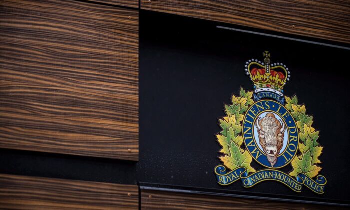 The RCMP logo is seen outside Royal Canadian Mounted Police "E" Division Headquarters, in Surrey, B.C., on April 13, 2018. (The Canadian Press/Darryl Dyck)