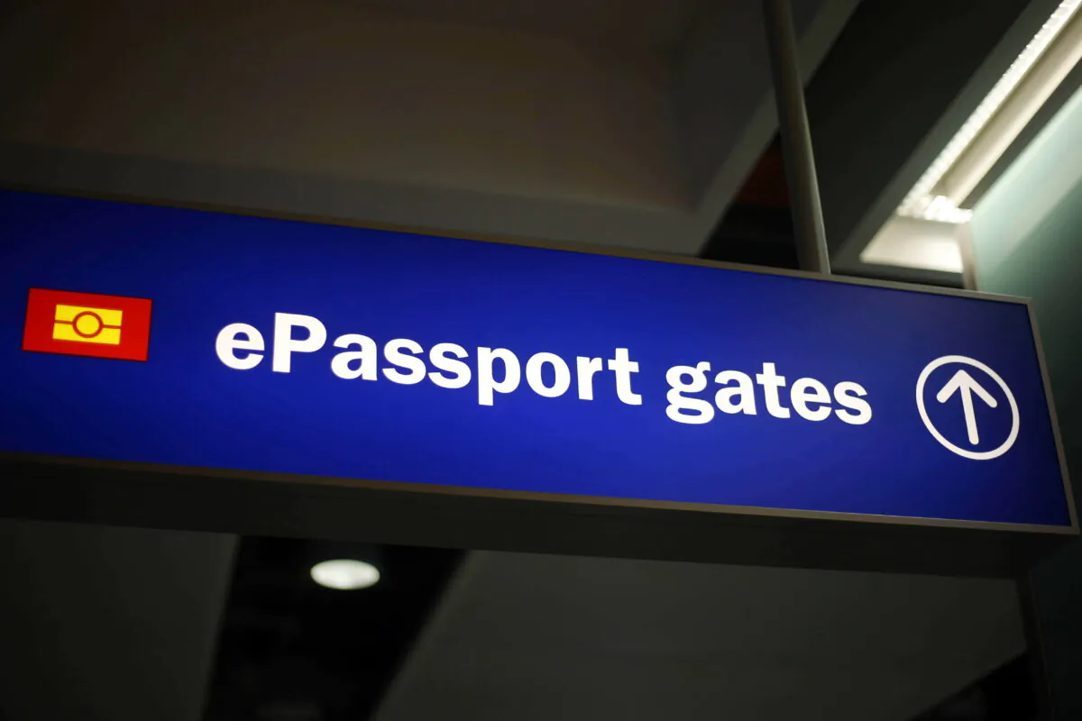 Undated photo of signage for passport gates at an airport. (Steve Parsons/PA)