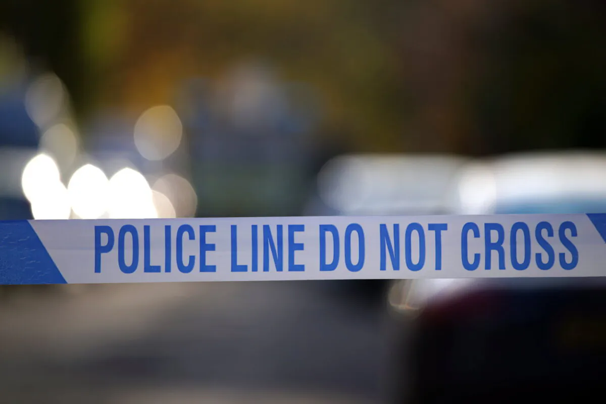Police tape in a file photo. (Peter Byrne/PA)