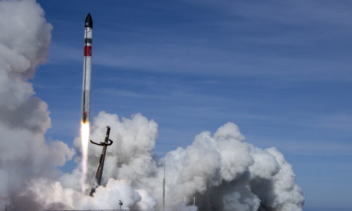 The Electron rocket blasts off for its "There And Back Again" mission from their launch pad on the Mahia Peninsula, New Zealand, on May 3, 2022. (Rocket Lab via AP)