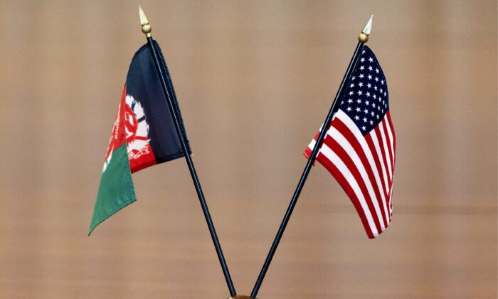 The flags of Afghanistan and the United States on the table before a meeting at the Pentagon in Washington on June 25, 2021. (Alex Brandon/AP Photo)