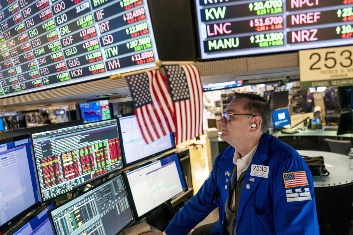 Trader Patrick King works the floor at the New York Stock Exchange on May 12, 2022. (John Minchillo, File/AP Photo)