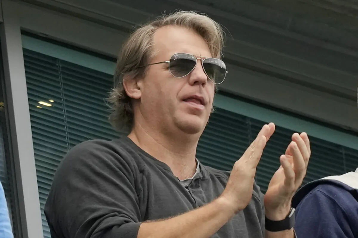 American businessman Todd Boehly applauds during the English Premier League soccer match between Chelsea and Wolverhampton at Stamford Bridge stadium, in London, on May 7, 2022. The Premier League has approved the proposed sale of Chelsea to a consortium fronted by Todd Boehly. (Frank Augstein/AP Photo)