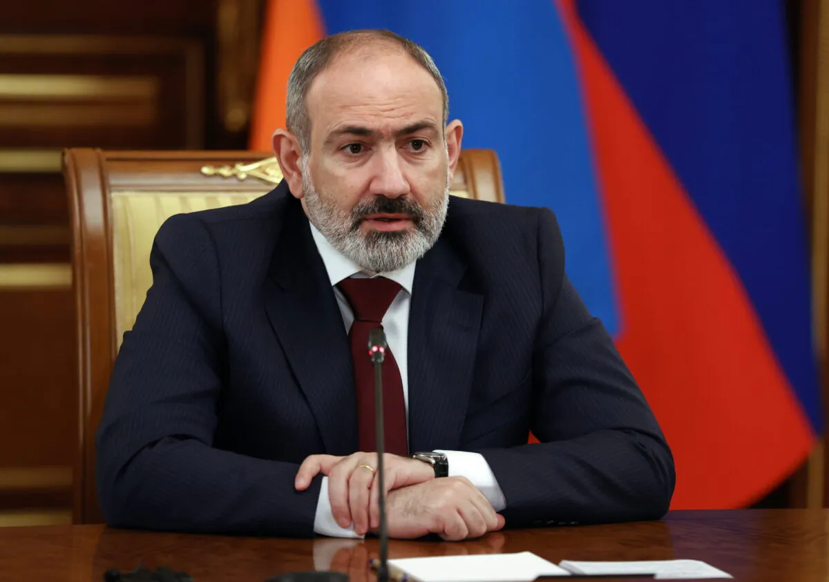 Armenian Prime Minister Nikol Pashinyan speaks to Russian Prime Minister Mikhail Mishustin during their talks in Moscow, Russia, on April 20, 2022. (Dmitry Astakhov, Sputnik, Government Pool Photo via AP)