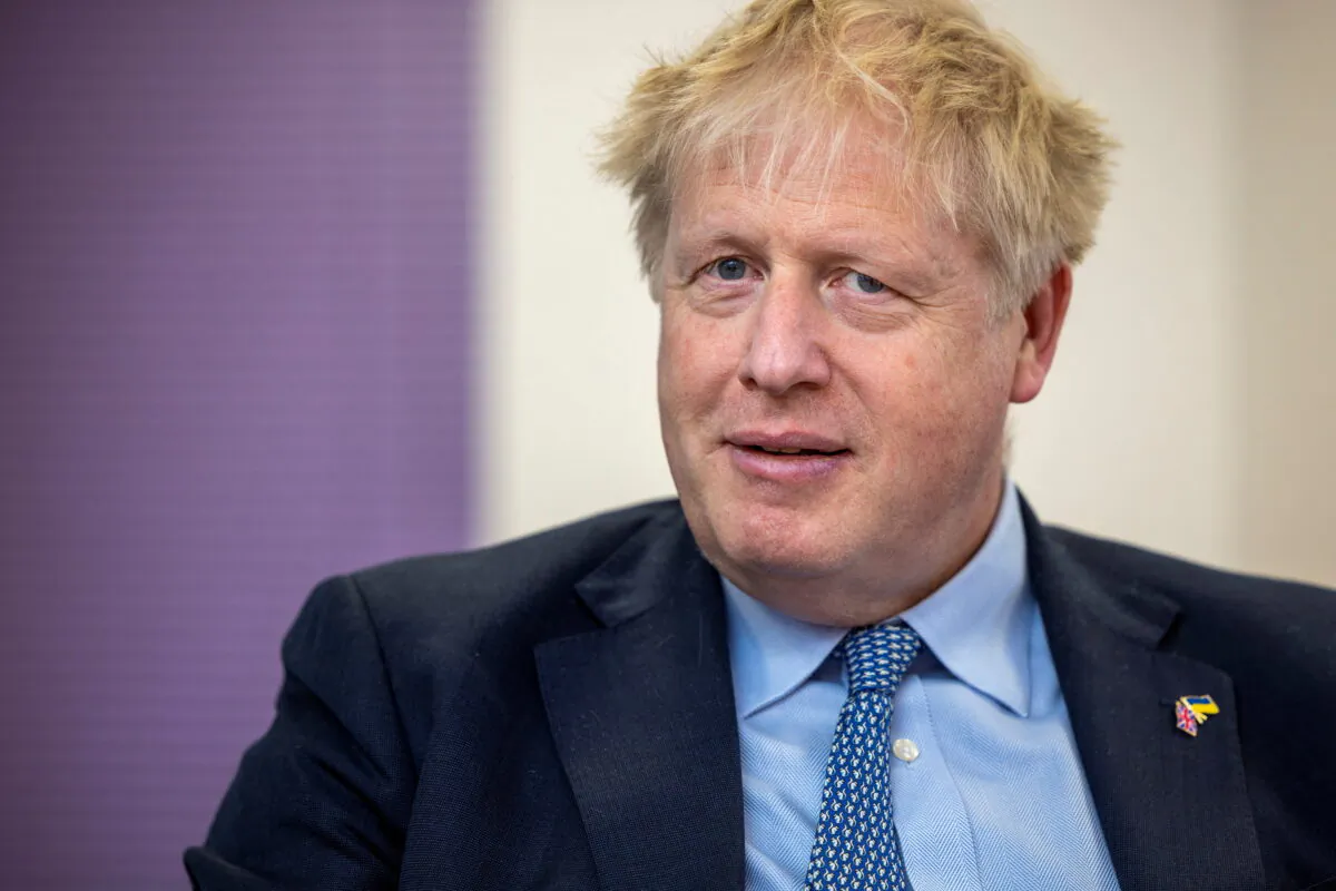 British Prime Minister Boris Johnson looks on during a visit to the CityFibre Training Academy in Stockton-on-Tees, Britain, on May 27, 2022. (James Glossop/Pool via Reuters)