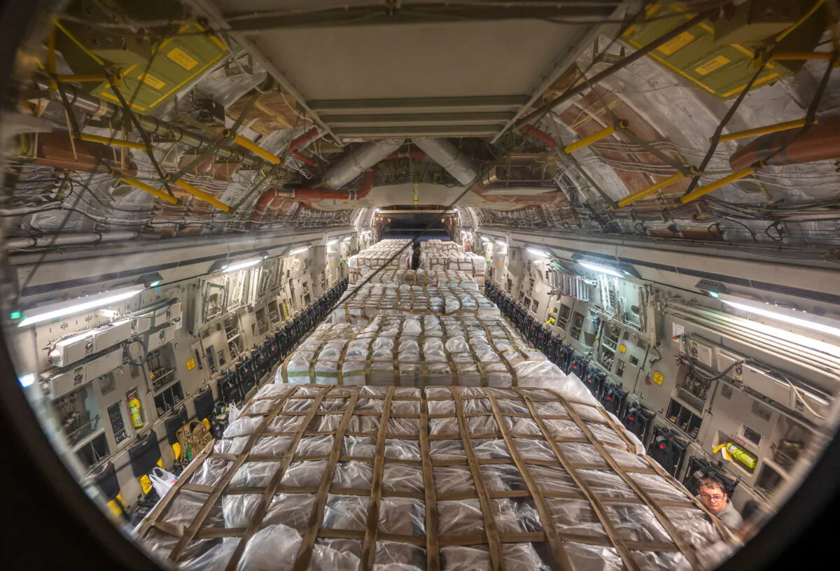 A U.S. Air Force C-17 Globemaster III carries pallets of Nestle infant formula bound for Indianapolis during Operation Fly Formula, at Ramstein Air Base, Germany, on May 22, 2022. (U.S. Air Force/Staff Sgt. Jacob Wongwai/Handout via Reuters)
