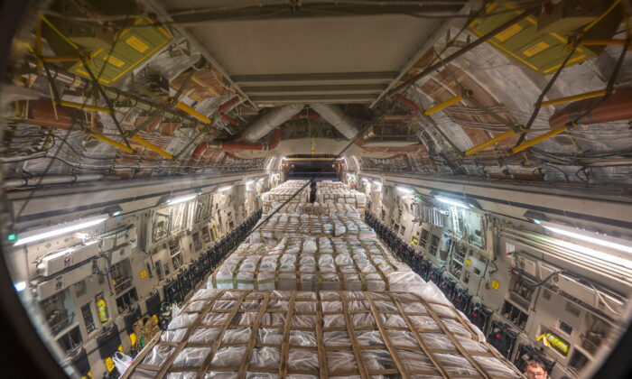A U.S. Air Force C-17 Globemaster III carries pallets of Nestle infant formula bound for Indianapolis during Operation Fly Formula, at Ramstein Air Base, Germany, on May 22, 2022. (U.S. Air Force/Staff Sgt. Jacob Wongwai/Handout via Reuters)