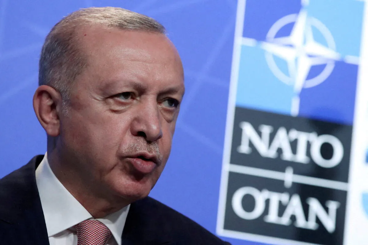 FILE PHOTO: Turkey's President Tayyip Erdogan holds a news conference during the NATO summit at the Alliance's headquarters in Brussels, Belgium June 14, 2021. REUTERS/Yves Herman