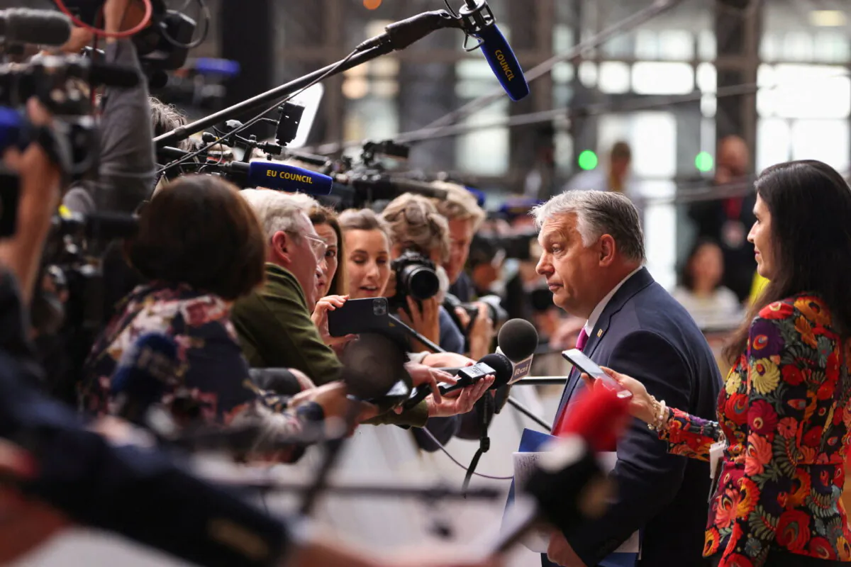 Hungary's Prime Minister Viktor Orban listens to a media question as he arrives for the European Union leaders summit, in Brussels, Belgium May 30, 2022. (Johanna Geron/Reuters)