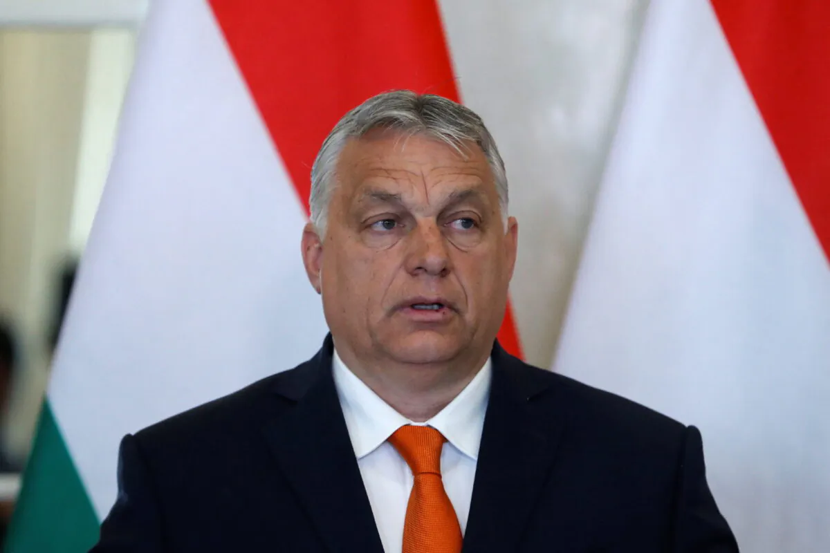 Hungarian Prime Minister Viktor Orban speaks as he and Hungarian President Janos Ader give a statement to the media after their talks at the Presidential Palace in Budapest, Hungary, on April 29, 2022. (Bernadett Szabo/Reuters)
