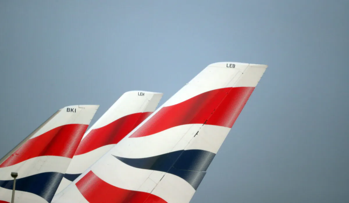 British Airways logos on tail fins at Heathrow Airport in west London, on Feb. 23, 2018. (Hannah McKay/Reuters)