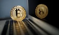 Bitcoin Tumbles to Lowest Value Since July 2021