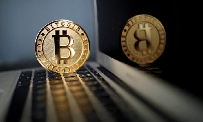A bitcoin representation is seen in an illustration picture taken at La Maison du Bitcoin in Paris, France, on June 23, 2017. (Benoit Tessier/Reuters)