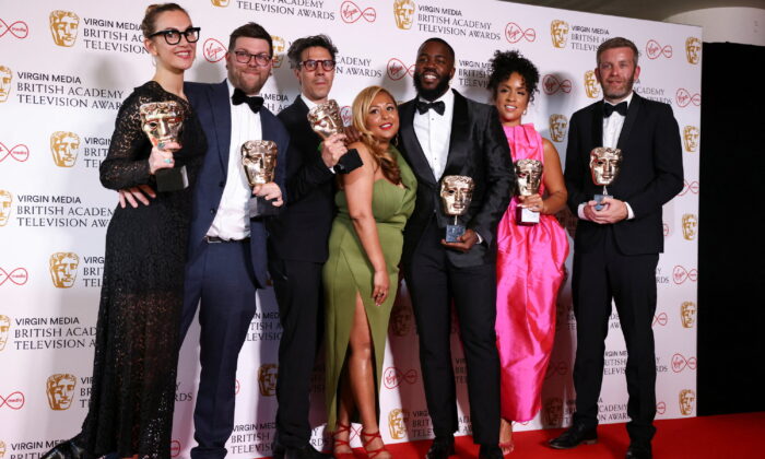 Mo Gilligan and the team of "The Lateish Show with Mo Gilligan" pose with the "Best Comedy/Entertainment Programme" award at the British Academy Television Awards in London on May 8, 2022. (Henry Nicholls/Reuters)