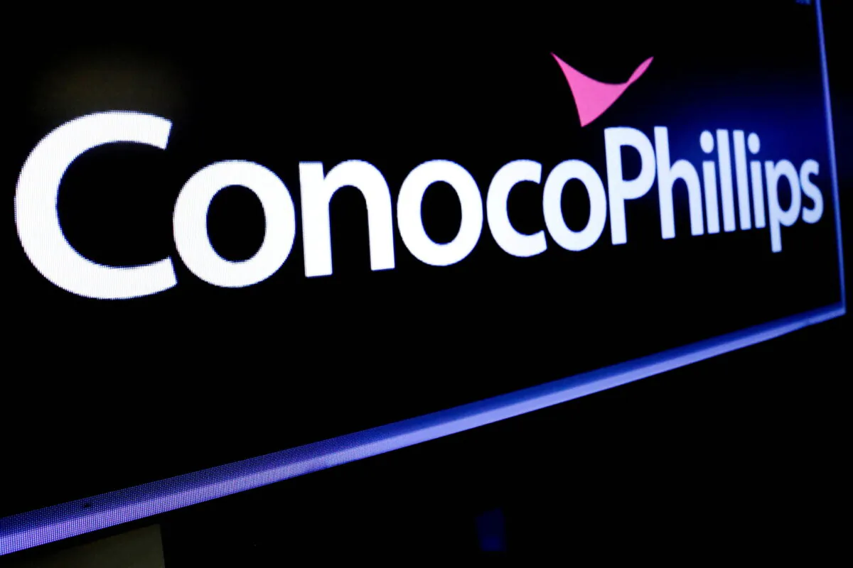 The logo for ConocoPhillips on a screen on the floor at the New York Stock Exchange (NYSE) in New York on Jan. 13, 2020. (Brendan McDermid/Reuters)