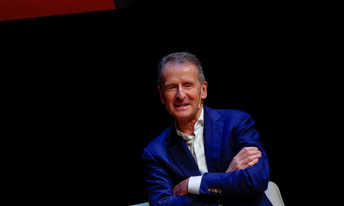 Volkswagen Chief Executive Officer (CEO) Herbert Diess speaks at 'Motion. Autos, Art, Architecture', an exhibition exploring parallels between the automobile and the art world, at Guggenheim Museum Bilbao, in Bilbao, Spain, on April 6, 2022. (Vincent West/Reuters)