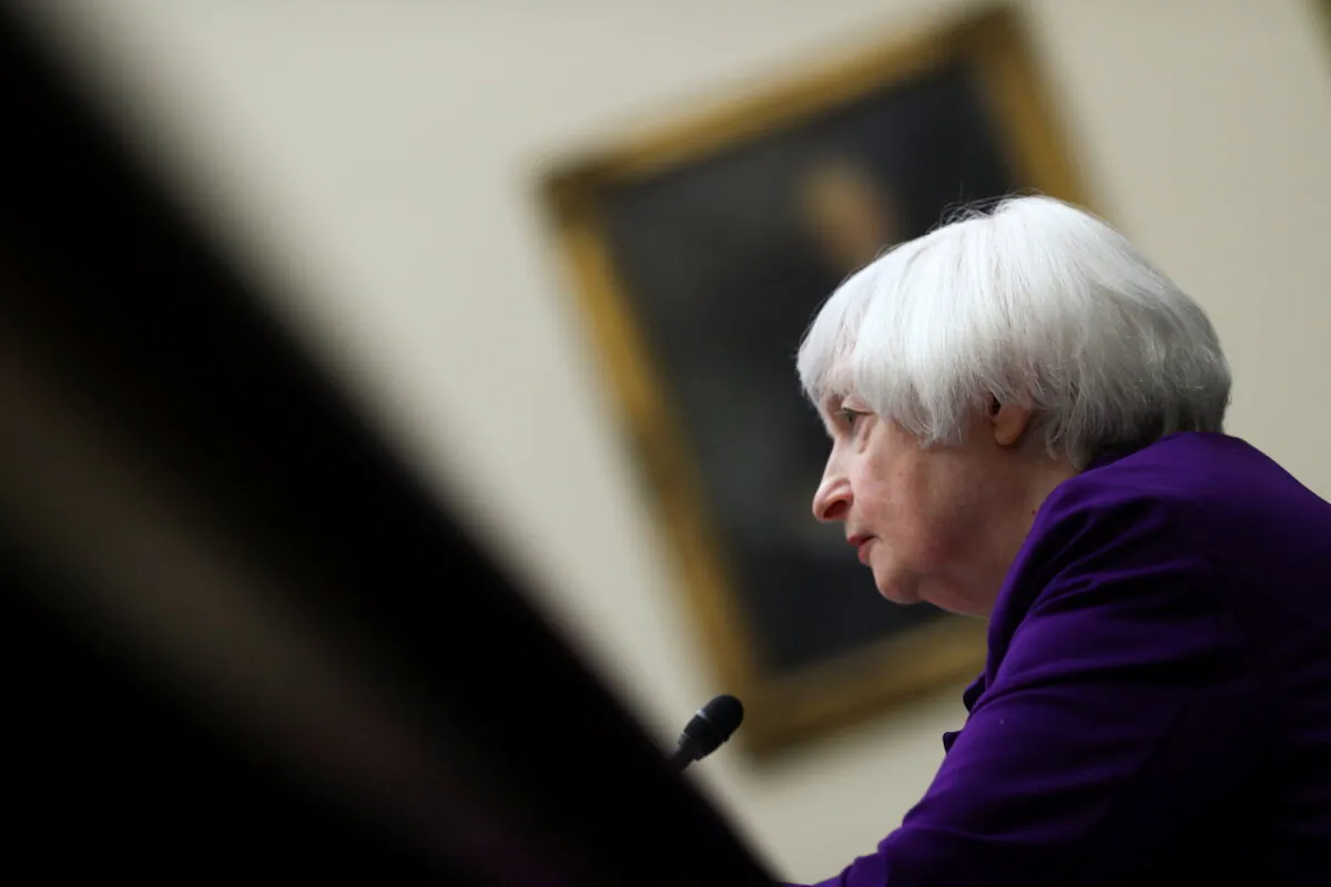 FILE PHOTO: U.S. Treasury Secretary Janet Yellen testifies before a House Financial Services Committee hearing on "the State of the International Financial System,” on Capitol Hill in Washington, U.S., April 6, 2022. REUTERS/Tom Brenner