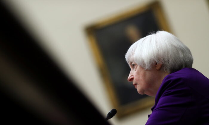 FILE PHOTO: U.S. Treasury Secretary Janet Yellen testifies before a House Financial Services Committee hearing on "the State of the International Financial System,” on Capitol Hill in Washington, U.S., April 6, 2022. REUTERS/Tom Brenner