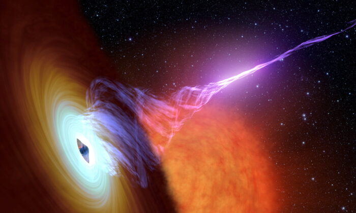 This artist’s concept shows a black hole with an accretion disk—a flat structure of material orbiting the black hole, and a jet of hot gas, called plasma, on Oct. 30, 2017. (NASA/JPL-Caltech/Handout via Reuters) 