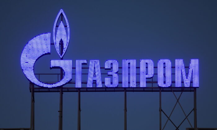 The logo of Gazprom company is seen on the facade of a business center in Saint Petersburg, Russia, on March 31, 2022.  (Reuters photographer/Reuters)