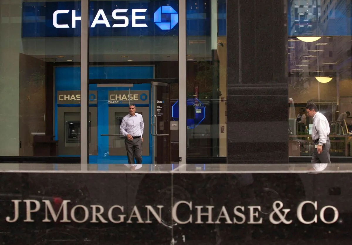 A customer exits the lobby of JPMorgan Chase & Co. headquarters in New York, on May 14, 2012. (Eduardo Munoz/Reuters)