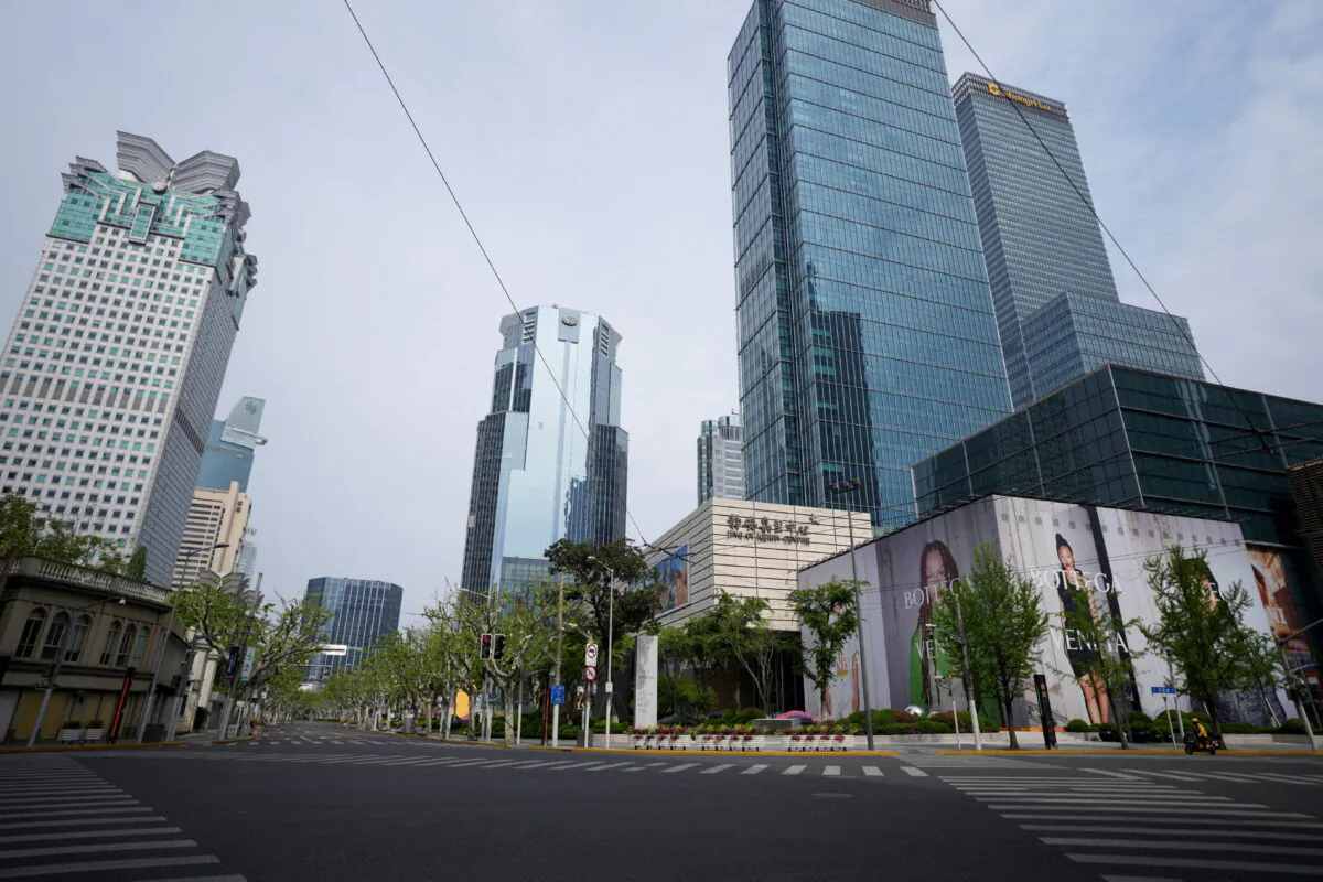 An empty road is seen in Shanghai Central Business District (CBD) during a lockdown amid the COVID-19 pandemic in Shanghai, China, on April 16, 2022. (Aly Song/Reuters)