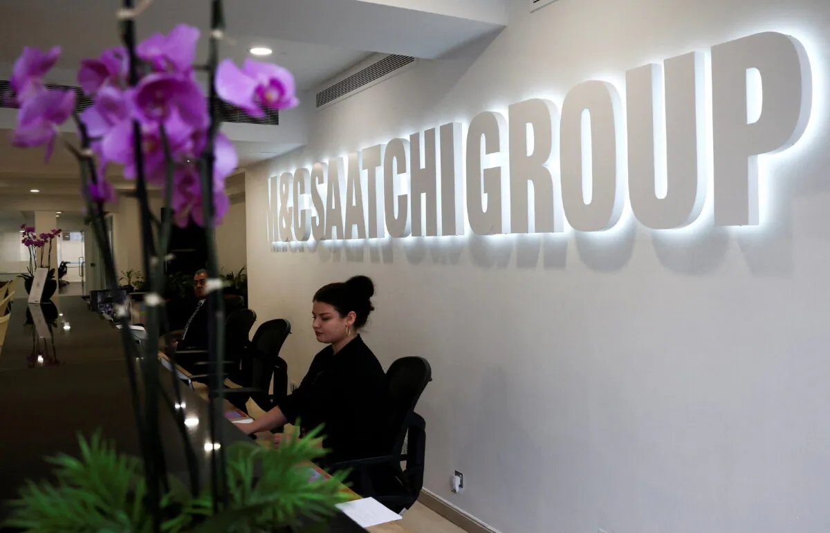 Signage at the reception of the M&C Saatchi office in central London on Jan. 6, 2022. (Henry Nicholls/Reuters)
