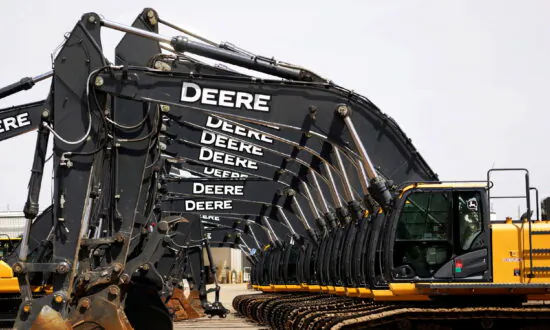 Deere Lifts Profit Forecast, but Shares Slip on Revenue Miss
