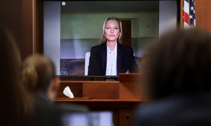 Model Kate Moss, a former girlfriend of actor Johnny Depp, testifies via video link during Depp's defamation trial against his ex-wife Amber Heard, at the Fairfax County Circuit Courthouse in Fairfax, Va., on May 25, 2022. (Evelyn Hockstein/Reuters)