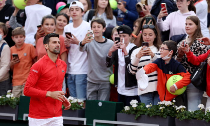Serbia's Novak Djokovic celebrates winning his second round match against Slovakia's Alex Molcan at the French Open in Roland Garros stadium in Paris on May 25, 2022. (Yves Herman/Reuters)