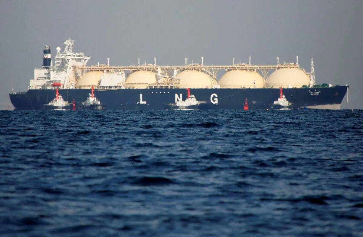 A liquefied natural gas (LNG) tanker is tugged towards a thermal power station in Futtsu, east of Tokyo, Japan on Nov. 13, 2017. (Issei Kato/ Reuters)