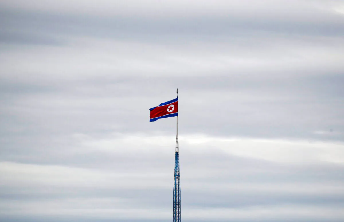 A North Korean flag flutters on top of a 160-metre tower in North Korea's propaganda village of Gijungdong, picture taken from the Tae Sung freedom village near the Military Demarcation Line (MDL), inside the demilitarised zone separating the two Koreas, in Paju, South Korea, on April 24, 2018. (Kim Hong-Ji/Reuters)