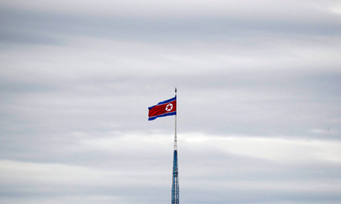 A North Korean flag flutters on top of a 160-metre tower in North Korea's propaganda village of Gijungdong, picture taken from the Tae Sung freedom village near the Military Demarcation Line (MDL), inside the demilitarised zone separating the two Koreas, in Paju, South Korea, on April 24, 2018. (Kim Hong-Ji/Reuters)