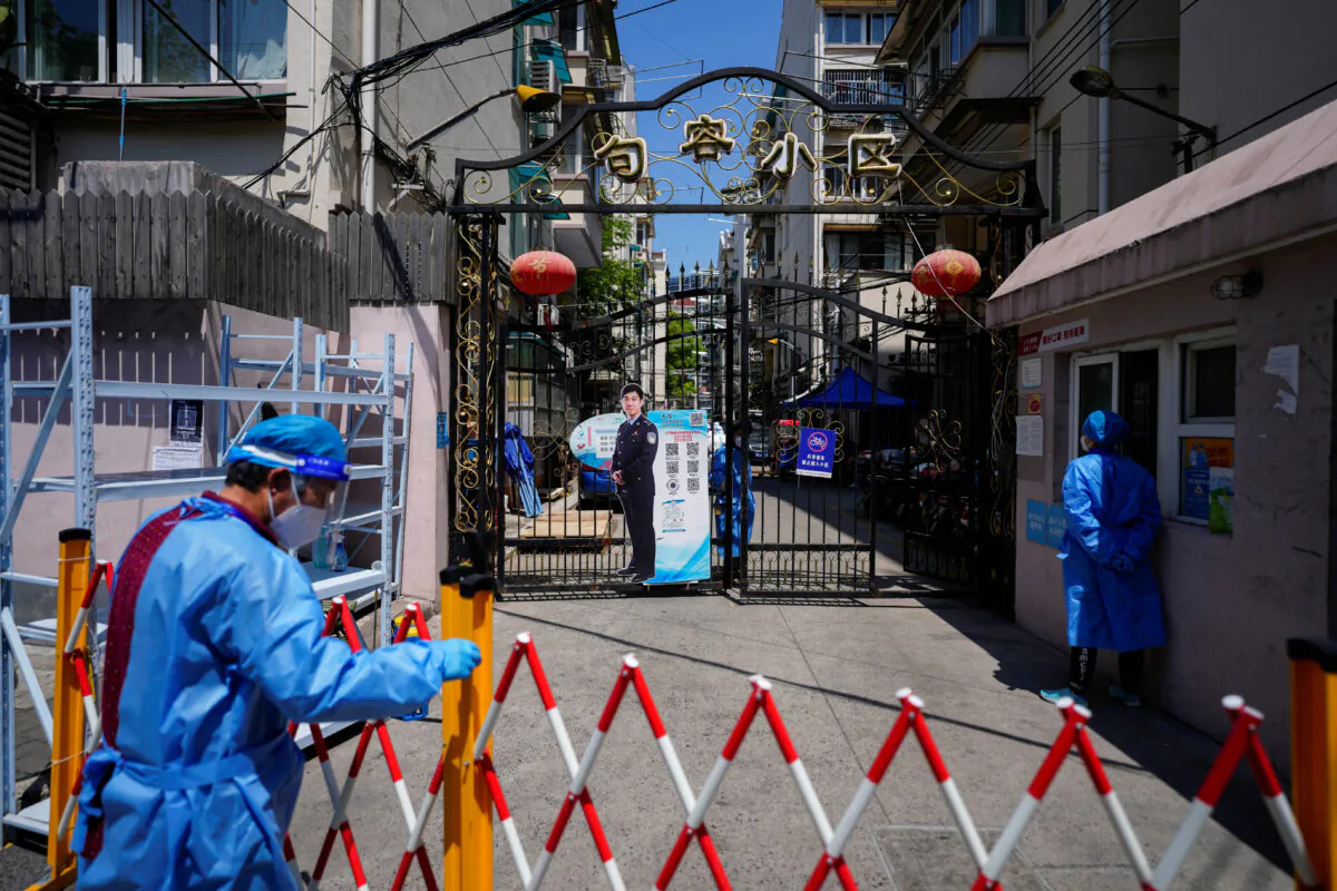 The closed entrance of a residential area is pictured during the lockdown in Shanghai, China, on May 5, 2022. (Aly Song/Reuters)