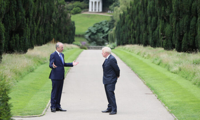 British Prime Minister Boris Johnson (R) and Ireland's Taoiseach Micheal Martin walking in the gardens of Hillsborough Castle during a visit to Belfast, Northern Ireland, on August 13, 2020. (Brian Lawless/WPA Pool/Getty Images)

