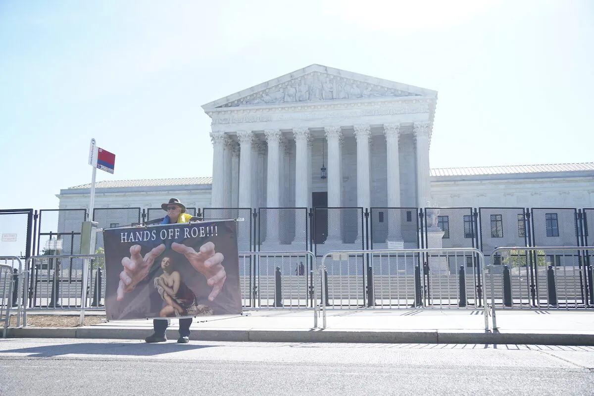 A double layer of barricades surrounds the U.S. Supreme Court in Washington on May 10, 2022 (Jackson Elliott/The Epoch Times)