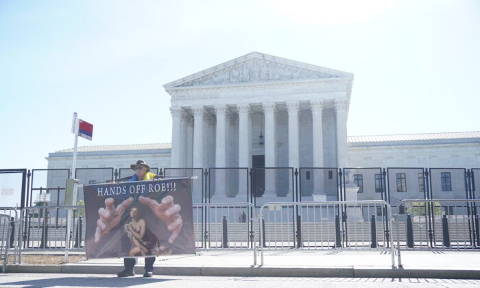 A double layer of barricades surrounds the U.S. Supreme Court in Washington on May 10, 2022 (Jackson Elliott/The Epoch Times)