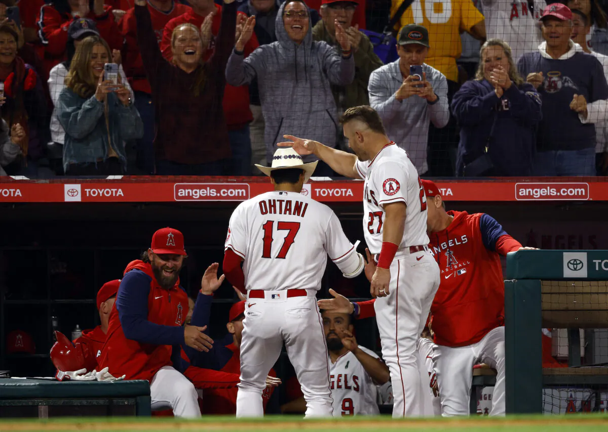 Shohei Ohtani #17 and Mike Trout #27 of the Los Angeles Angels celebrate a home run against the Tampa Bay Rays in the sixth inning at Angel Stadium of Anaheim, in Anaheim, on May 9, 2022. (Ronald Martinez/Getty Images)