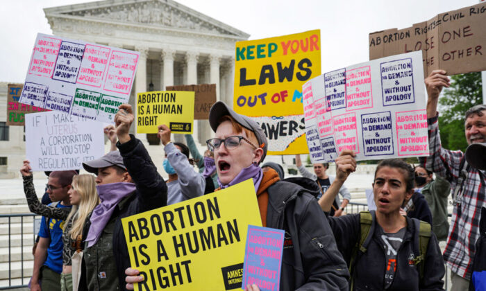 Pro-abortion activists protest in front of the Supreme Court in Washington on May 3, 2022, in response to a leaked draft opinion showing the court's intention to overturn Roe v. Wade. (Alex Wong/Getty Images)