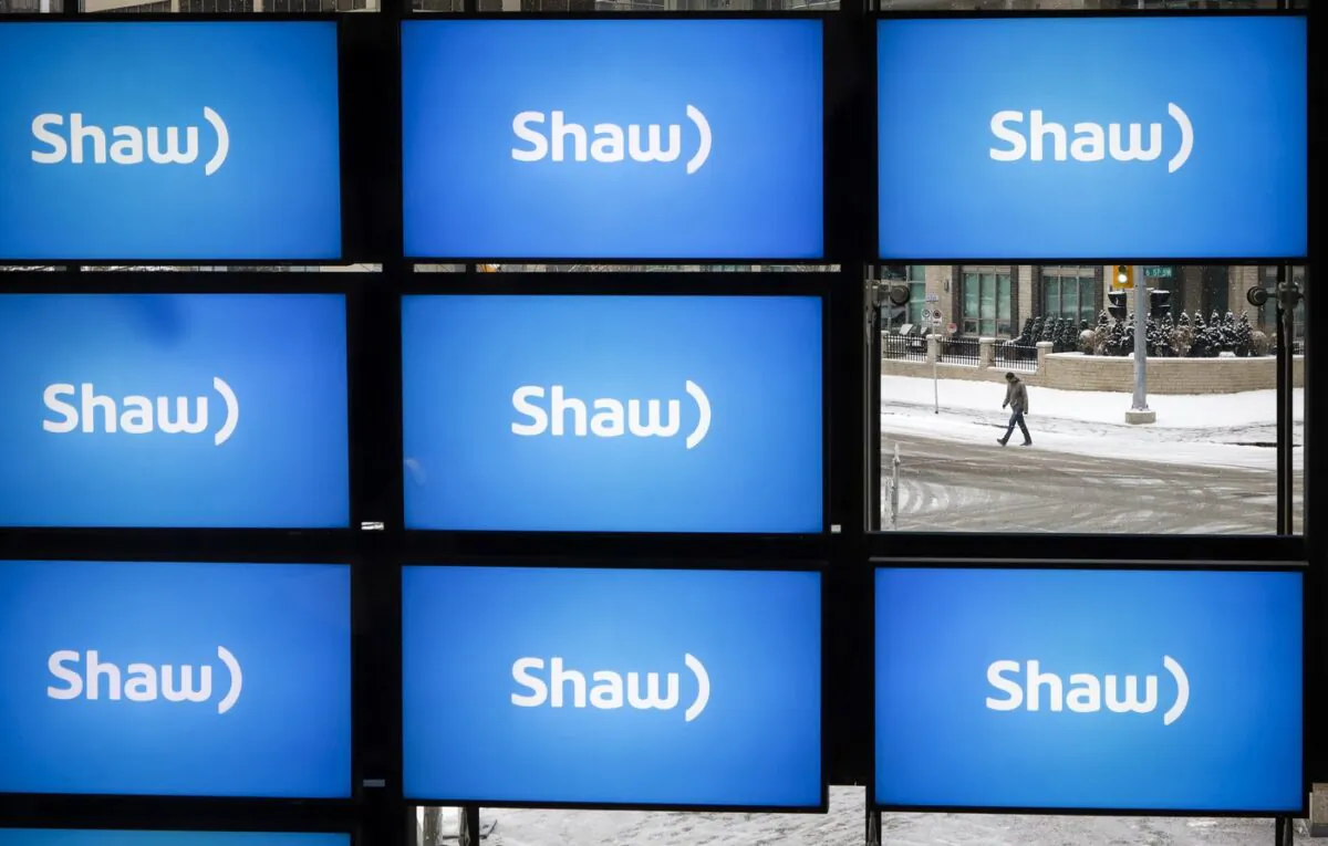 Shaw logos on display at the company's annual meeting in Calgary, Jan. 17, 2019. (The Canadian Press/Jeff McIntosh)
