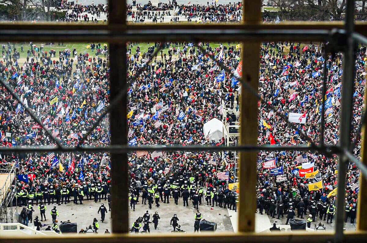 Police and protesters outside the U.S. Capitol's Rotunda in Washington on Jan. 6, 2021. (Olivier Douliery/AFP via Getty Images)