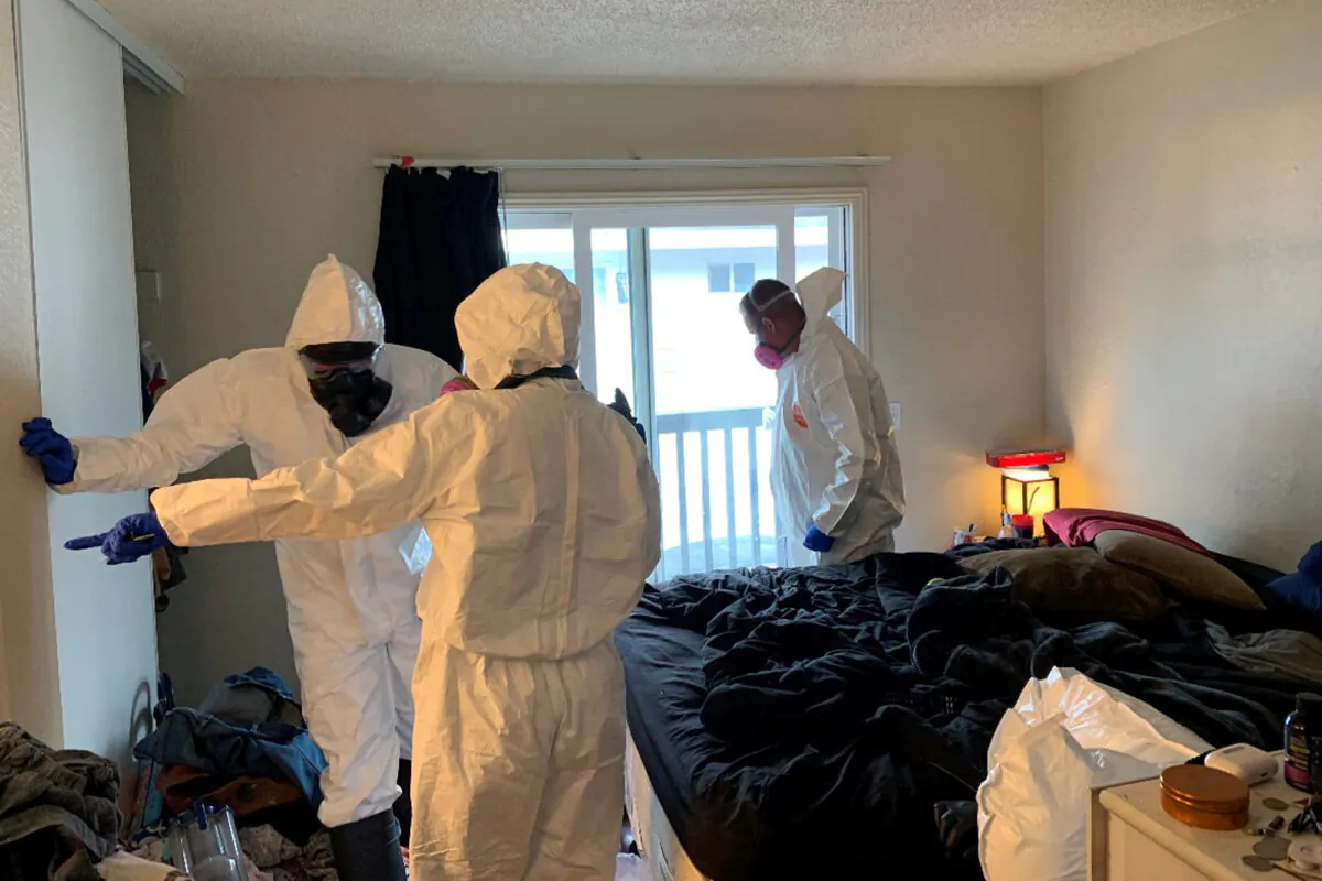 Investigators collect evidence from the home of Evan Frostick, 26, and Madison Bernard, 23, the parents of a 15-month-old toddler found unresponsive in a bedroom in Santa Rosa, Calif., on May 9, 2022. (Santa Rosa Police Department via AP)