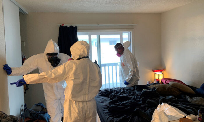Investigators collect evidence from the home of Evan Frostick, 26, and Madison Bernard, 23, the parents of a 15-month-old toddler found unresponsive in a bedroom in Santa Rosa, Calif., on May 9, 2022. (Santa Rosa Police Department via AP)