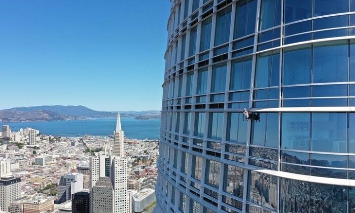 Maison Des Champs, known as "Pro-Life Spiderman," free-climbs the Salesforce Tower in San Francisco on May 3, 2022. (Courtesy of Bobby Elias)